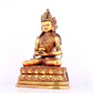 A solemn gilt bronze statue of Amitayus Buddha