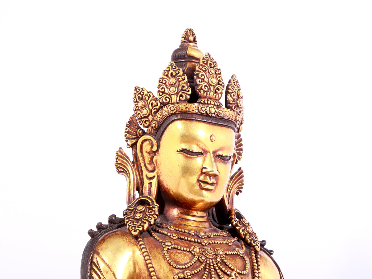 A solemn gilt bronze statue of Amitayus Buddha