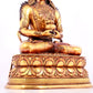 A solemn gilt bronze statue of Amitayus Buddha