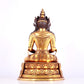 A solemn gilt bronze statue of Amitayus Buddha