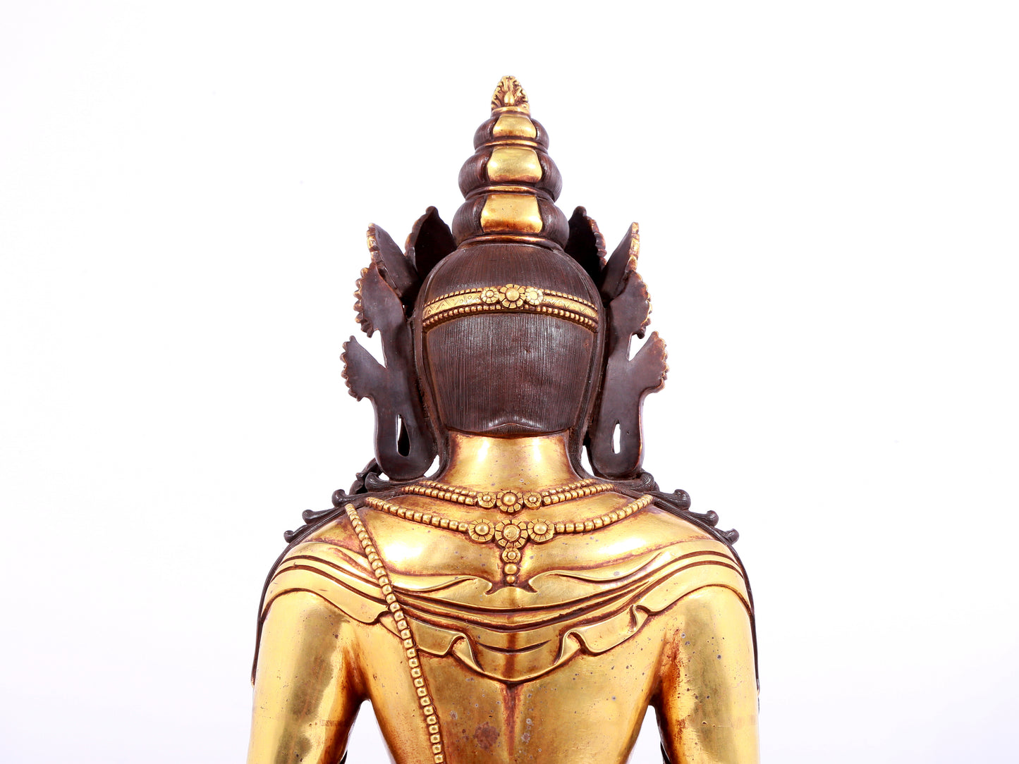 A solemn gilt bronze statue of Amitayus Buddha