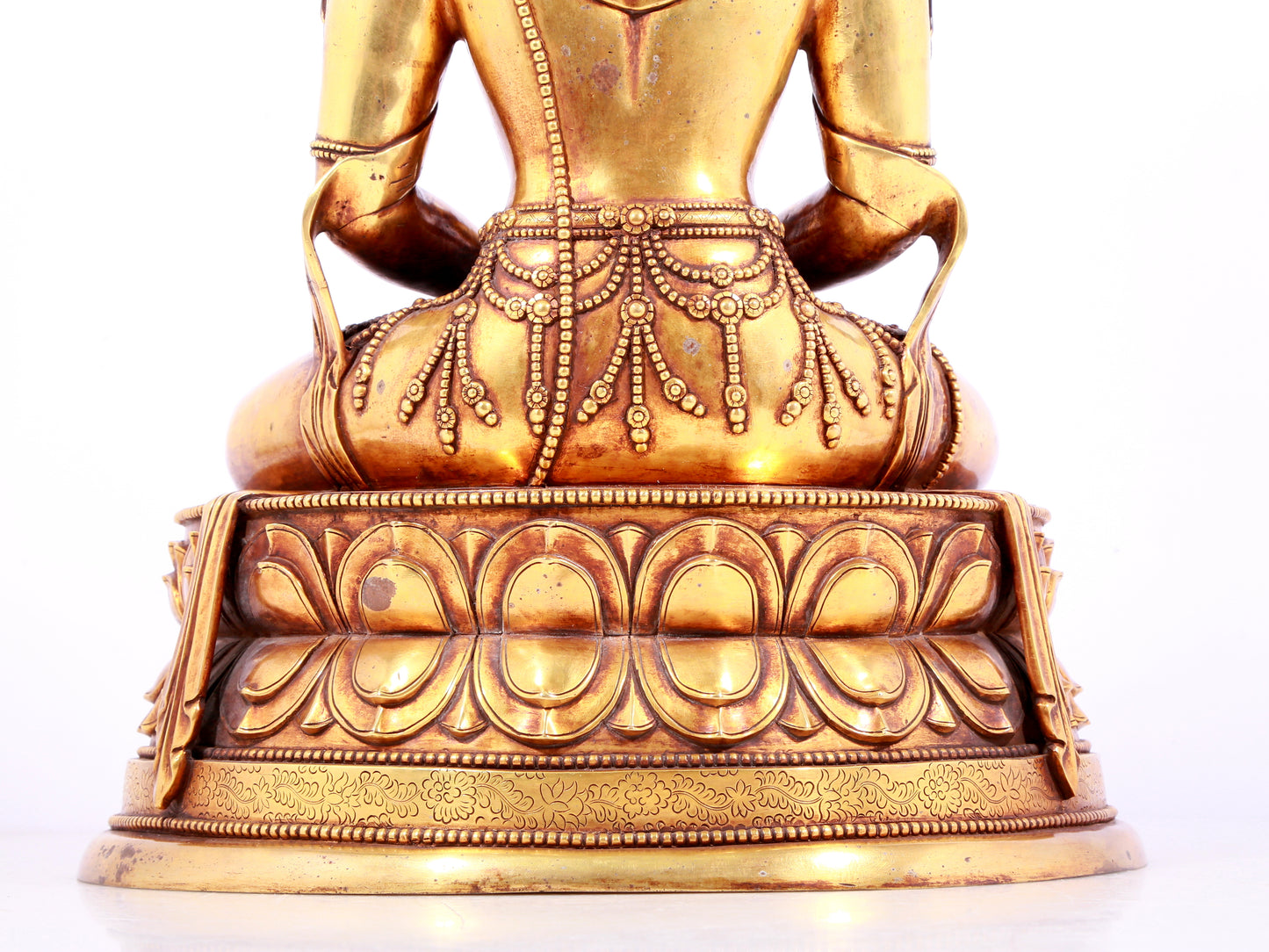 A solemn gilt bronze statue of Amitayus Buddha