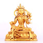 A solemn gilt bronze statue of green Tara