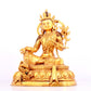 A solemn gilt bronze statue of green Tara