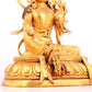 A solemn gilt bronze statue of green Tara