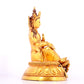 A solemn gilt bronze statue of green Tara