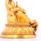 A solemn gilt bronze statue of green Tara