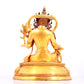 A solemn gilt bronze statue of green Tara