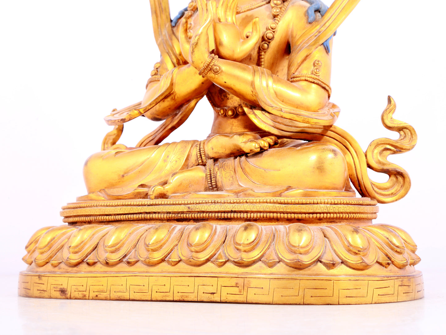 A solemn gilt bronze statue of Bodhisattva