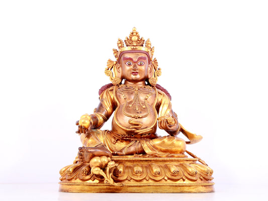 A solemn gilt bronze statue of Mammon