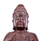 A solemn bronze Guanyin statue