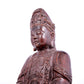 A solemn bronze Guanyin statue