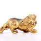 An exquisite gilt copper auspicious animal ornament