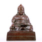 A solemn bronze statue of Tsongkhapa