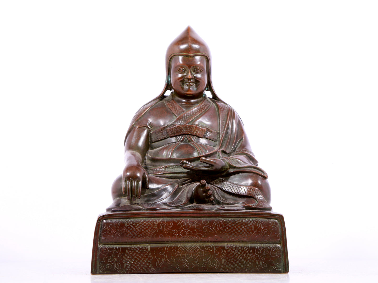 A solemn bronze statue of Tsongkhapa