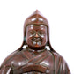 A solemn bronze statue of Tsongkhapa