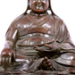 A solemn bronze statue of Tsongkhapa