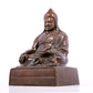 A solemn bronze statue of Tsongkhapa