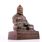 A solemn bronze statue of Tsongkhapa