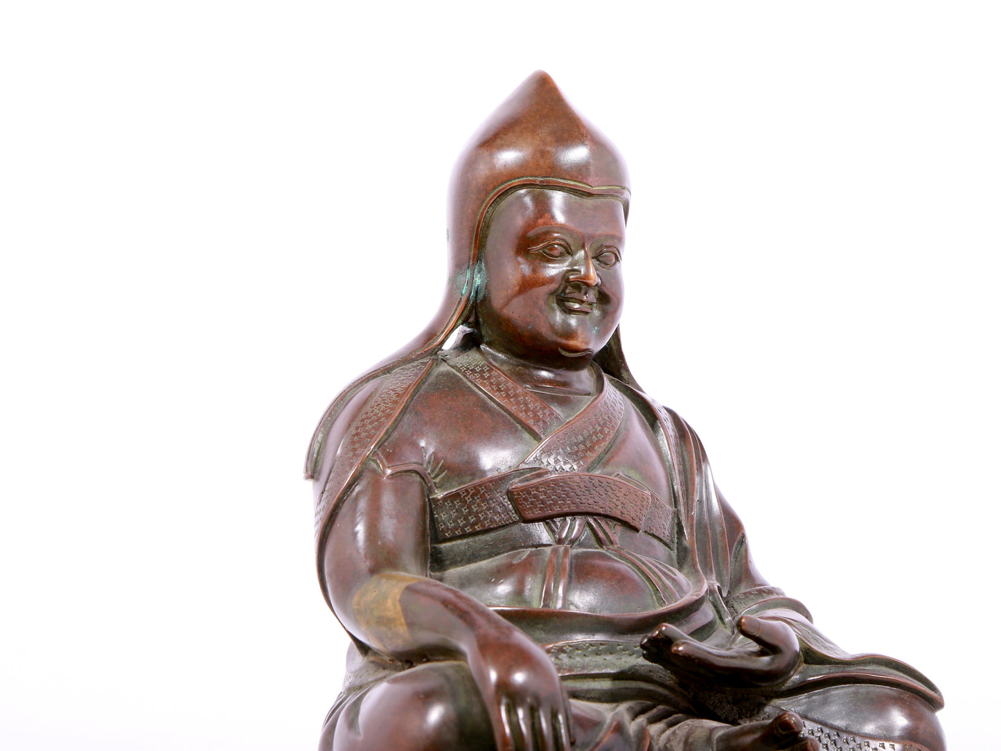 A solemn bronze statue of Tsongkhapa