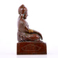 A solemn bronze statue of Tsongkhapa