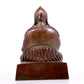 A solemn bronze statue of Tsongkhapa