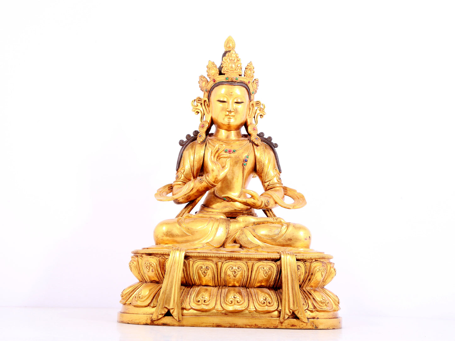 A solemn gilt bronze statue of Bodhisattva