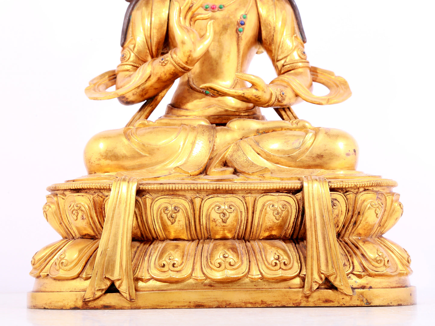 A solemn gilt bronze statue of Bodhisattva