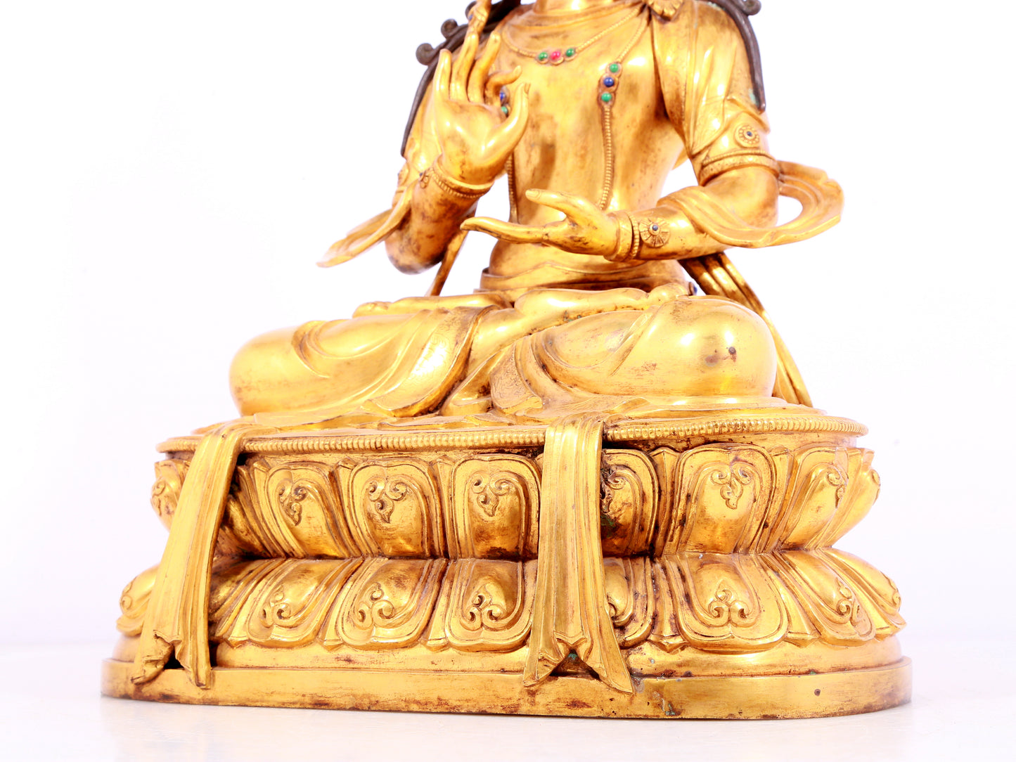 A solemn gilt bronze statue of Bodhisattva