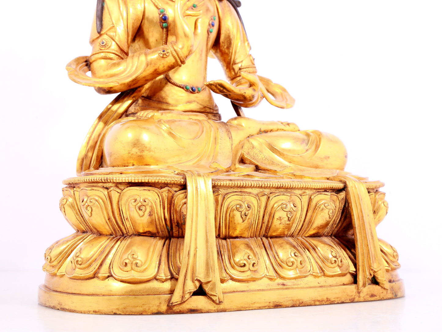 A solemn gilt bronze statue of Bodhisattva