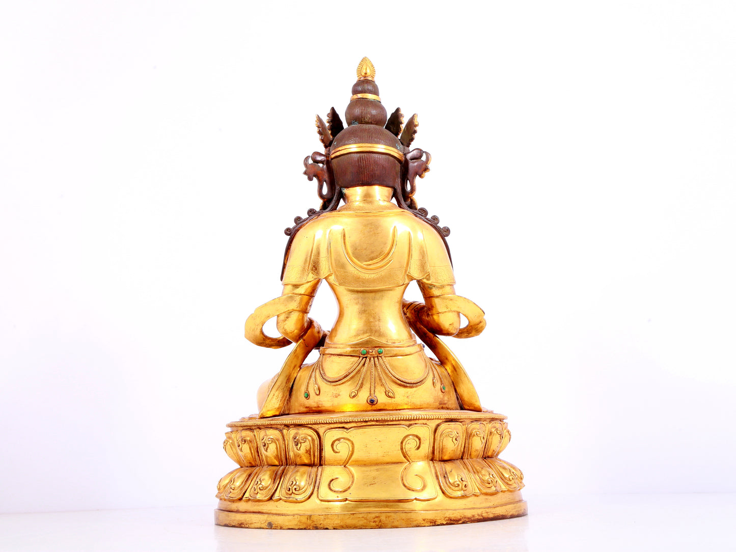 A solemn gilt bronze statue of Bodhisattva