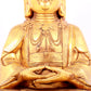 A solemn gilt bronze statue of Guanyin