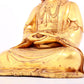 A solemn gilt bronze statue of Guanyin