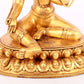 A solemn gilt bronze statue of green Tara