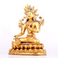 A solemn gilt bronze statue of green Tara