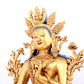 A solemn gilt bronze statue of green Tara