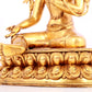 A solemn gilt bronze statue of green Tara