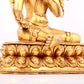 A solemn gilt bronze statue of green Tara