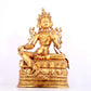 A solemn gilt bronze statue of green Tara