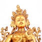 A solemn gilt bronze statue of green Tara