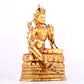 A solemn gilt bronze statue of green Tara