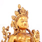 A solemn gilt bronze statue of green Tara