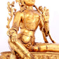 A solemn gilt bronze statue of green Tara