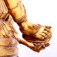 A solemn gilt bronze statue of green Tara