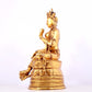 A solemn gilt bronze statue of green Tara