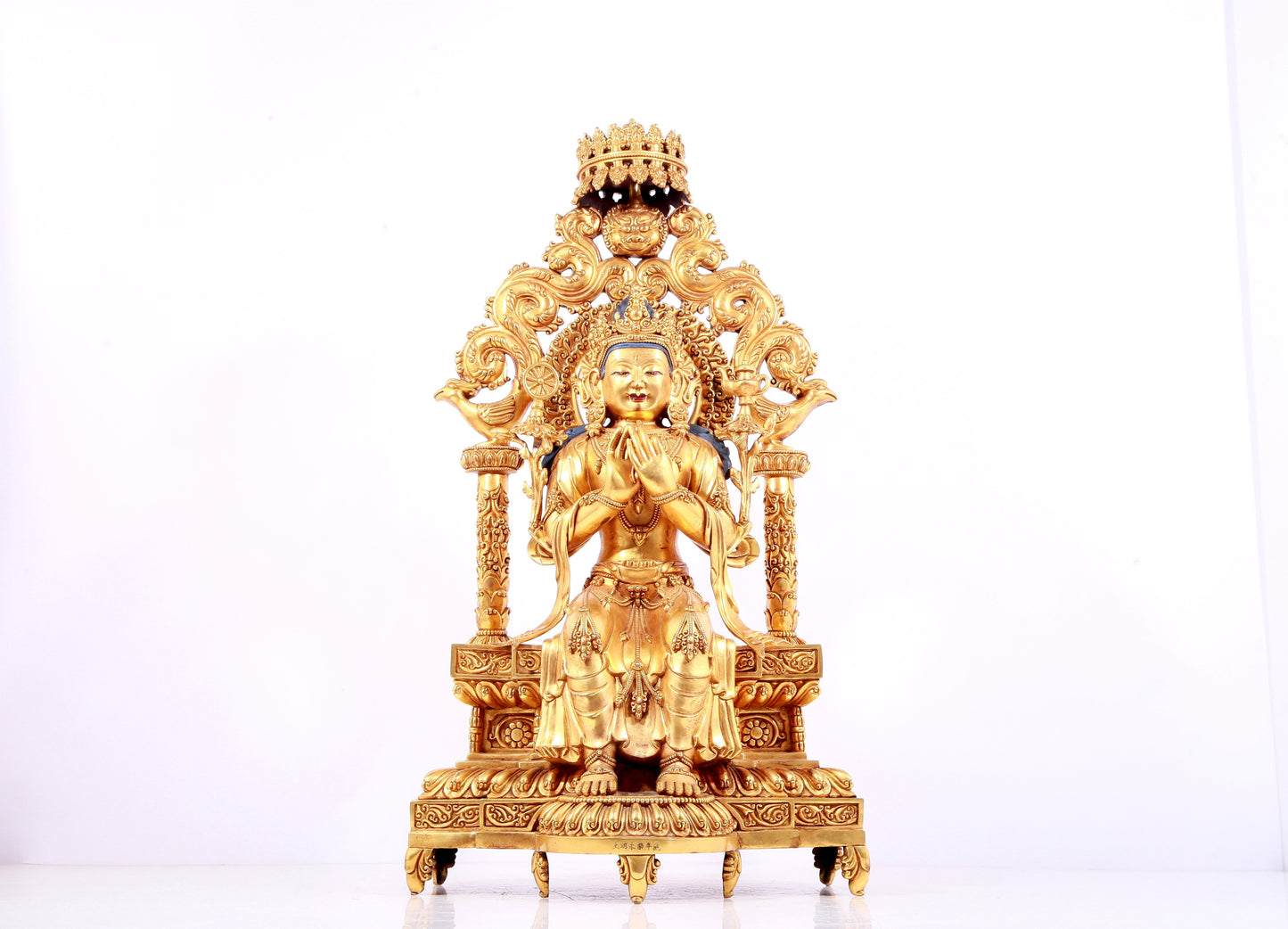 A solemn gilt bronze statue of Bodhisattva