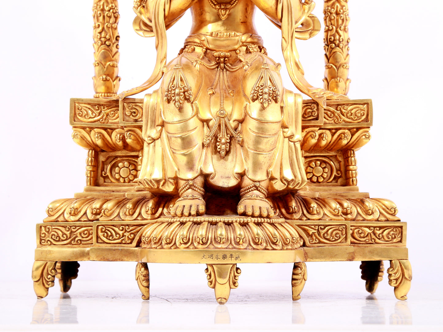 A solemn gilt bronze statue of Bodhisattva