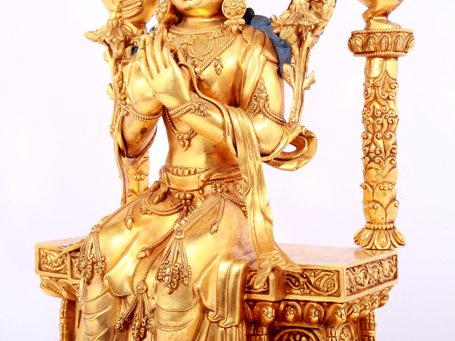 A solemn gilt bronze statue of Bodhisattva