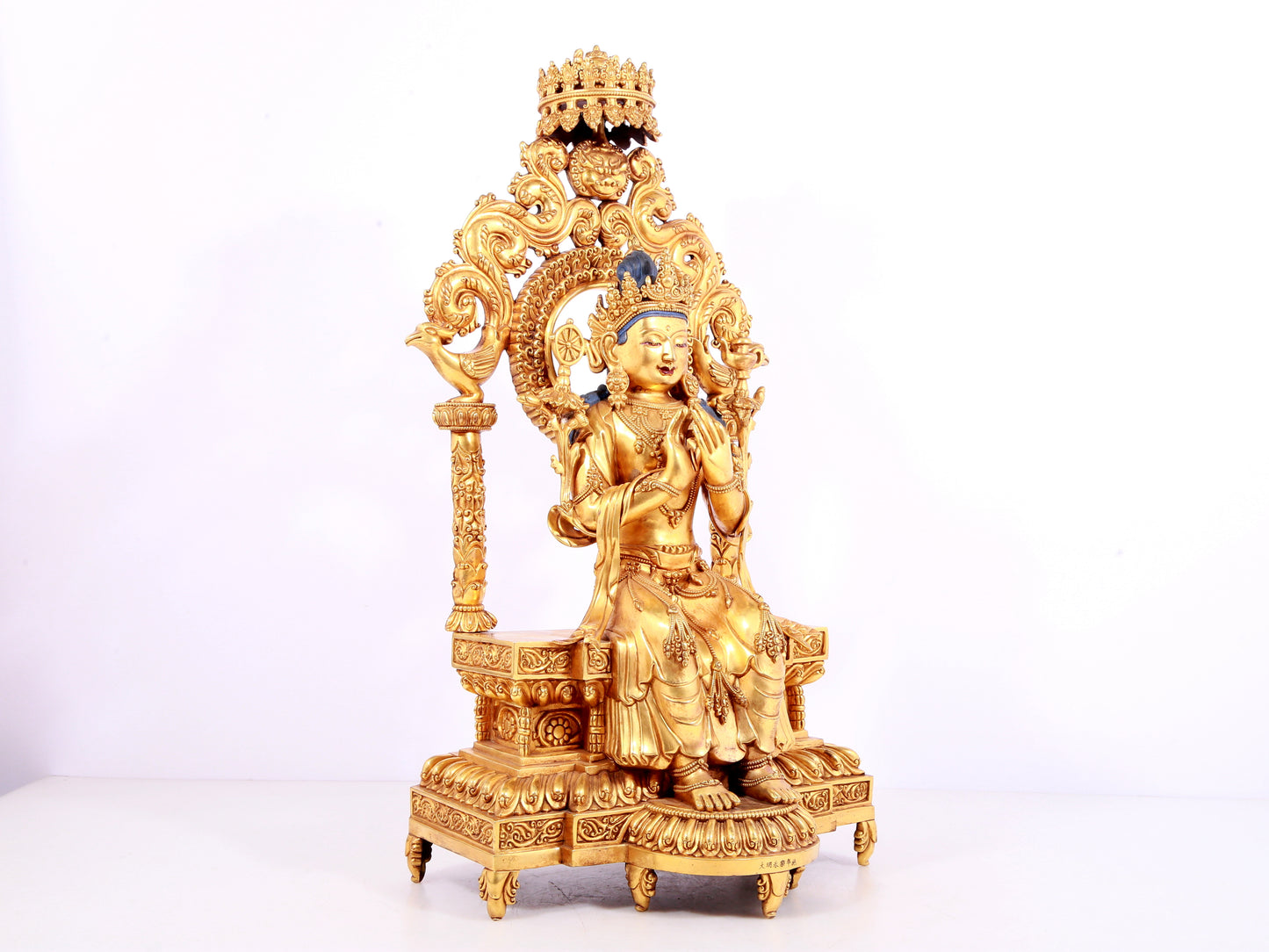 A solemn gilt bronze statue of Bodhisattva