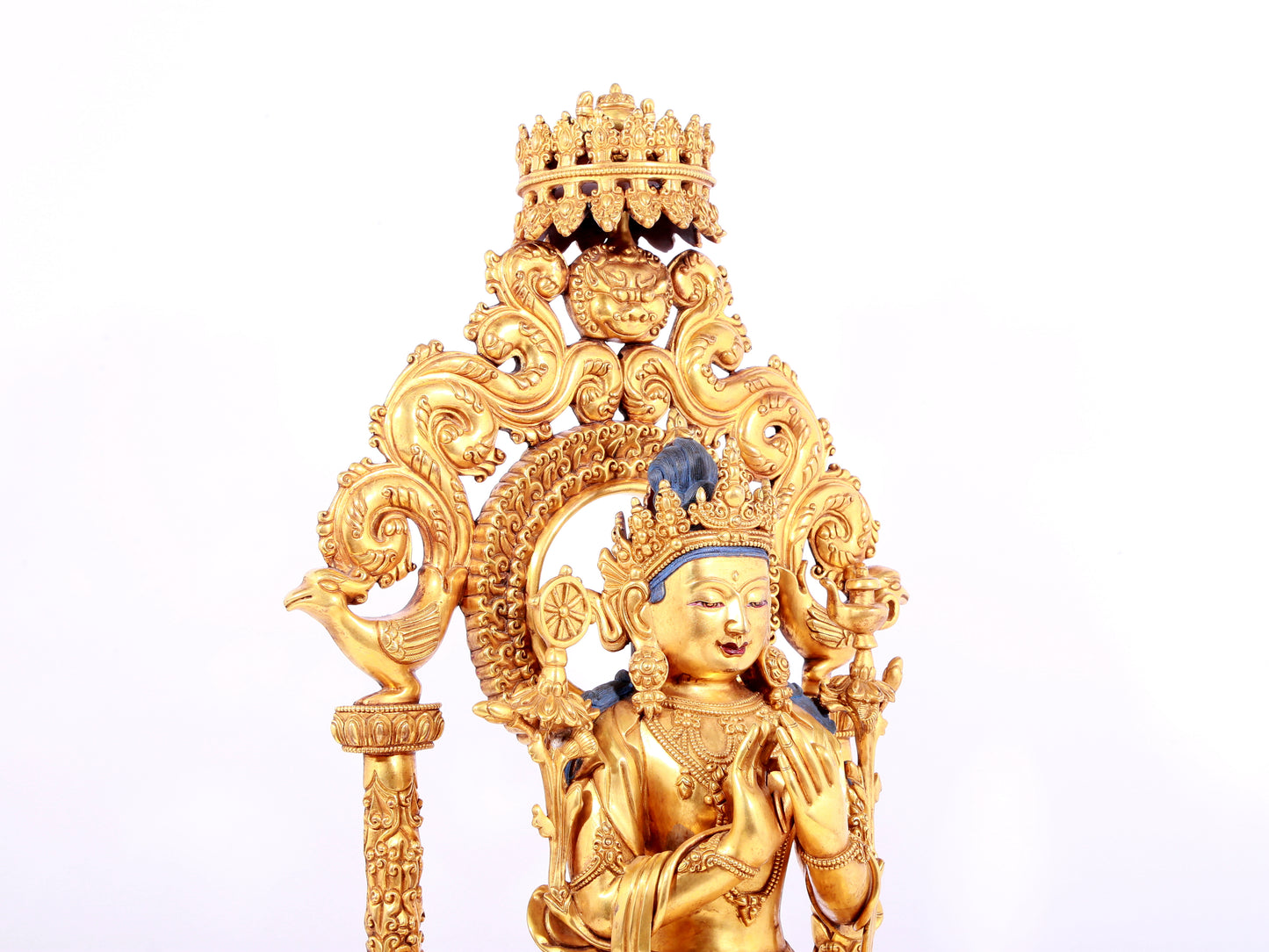 A solemn gilt bronze statue of Bodhisattva